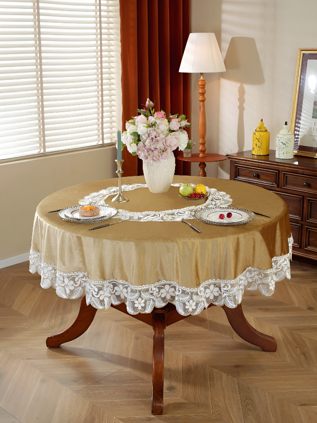 MONKDECOR Gold-Toned Floral Round 4-Seater Table Cover with Embroidered details
MONKDECOR Gold-Toned Floral Round 4-Seater Table Cover with Embroidered details