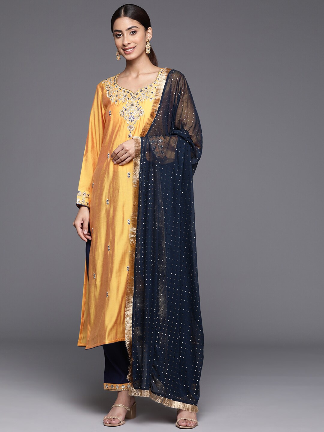 Varanga Ethnic Motifs Embroidered Regular Kurta with Trousers & With Dupatta, Yellow
Varanga Ethnic Motifs Embroidered Regular Kurta with Trousers & With Dupatta, Yellow