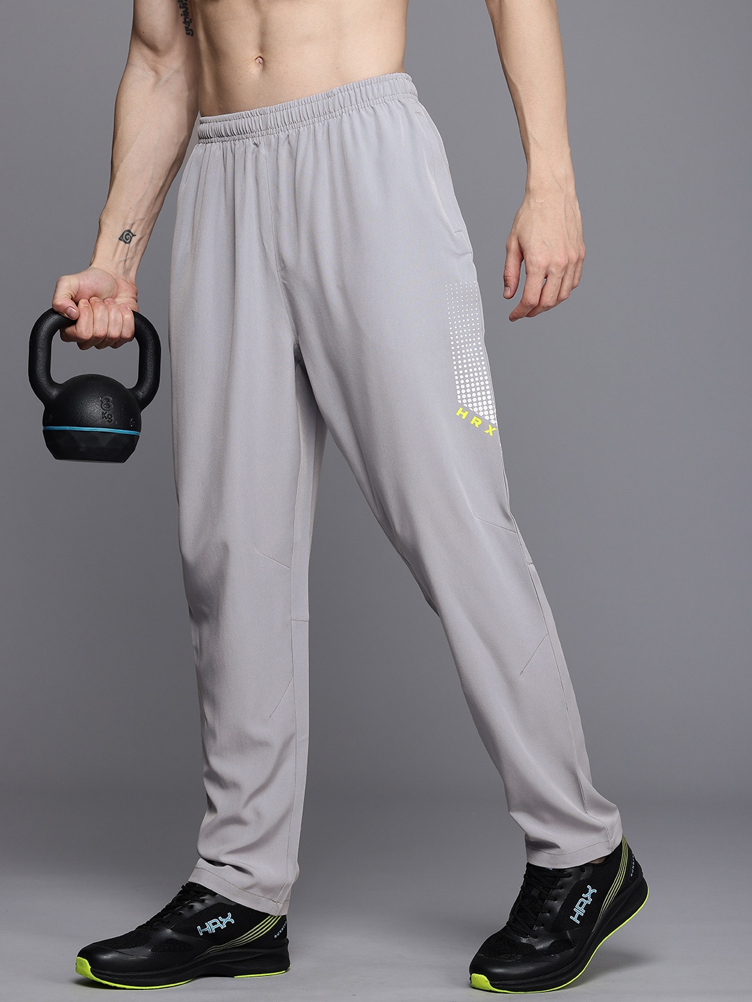 HRX by Hrithik Roshan Men Rapid Dry Antimicrobial Finish Training Track Pants, Grey
HRX by Hrithik Roshan Men Rapid Dry Antimicrobial Finish Training Track Pants, Grey