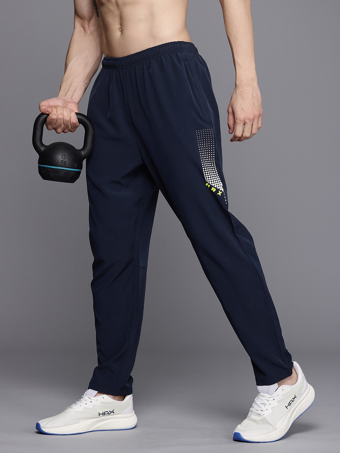 HRX by Hrithik Roshan Men Rapid Dry Antimicrobial Finish Training Track Pants, Navy blue
HRX by Hrithik Roshan Men Rapid Dry Antimicrobial Finish Training Track Pants, Navy blue