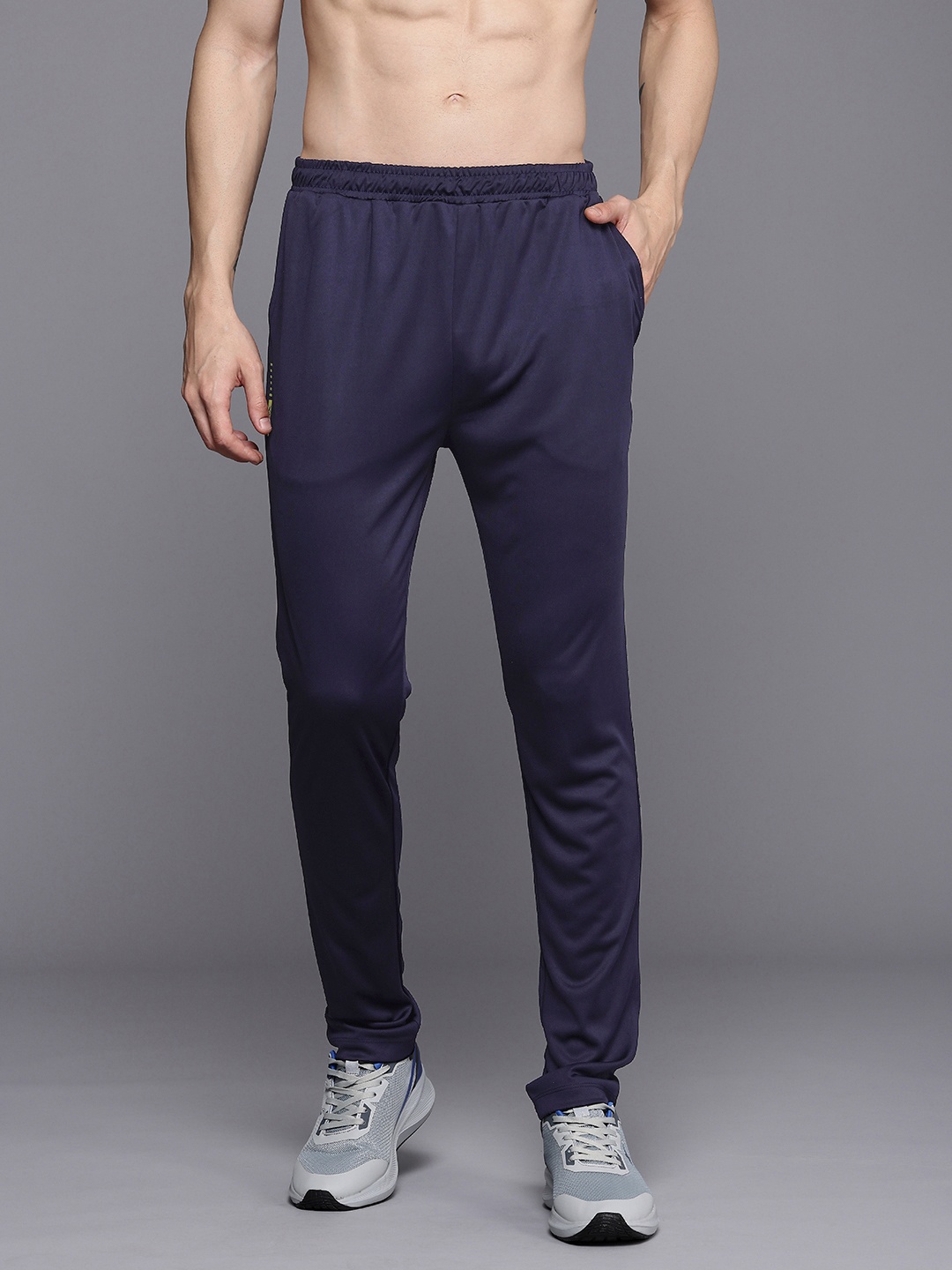 HRX by Hrithik Roshan Men Rapid-Dry Antimicrobial Finish Running Track Pants, Navy blue
HRX by Hrithik Roshan Men Rapid-Dry Antimicrobial Finish Running Track Pants, Navy blue