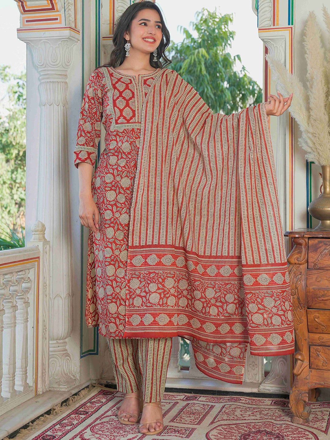 Vbuyz Red Floral Printed Notch Neck Pure Cotton Straight Kurta With Trousers & Dupatta
Vbuyz Red Floral Printed Notch Neck Pure Cotton Straight Kurta With Trousers & Dupatta