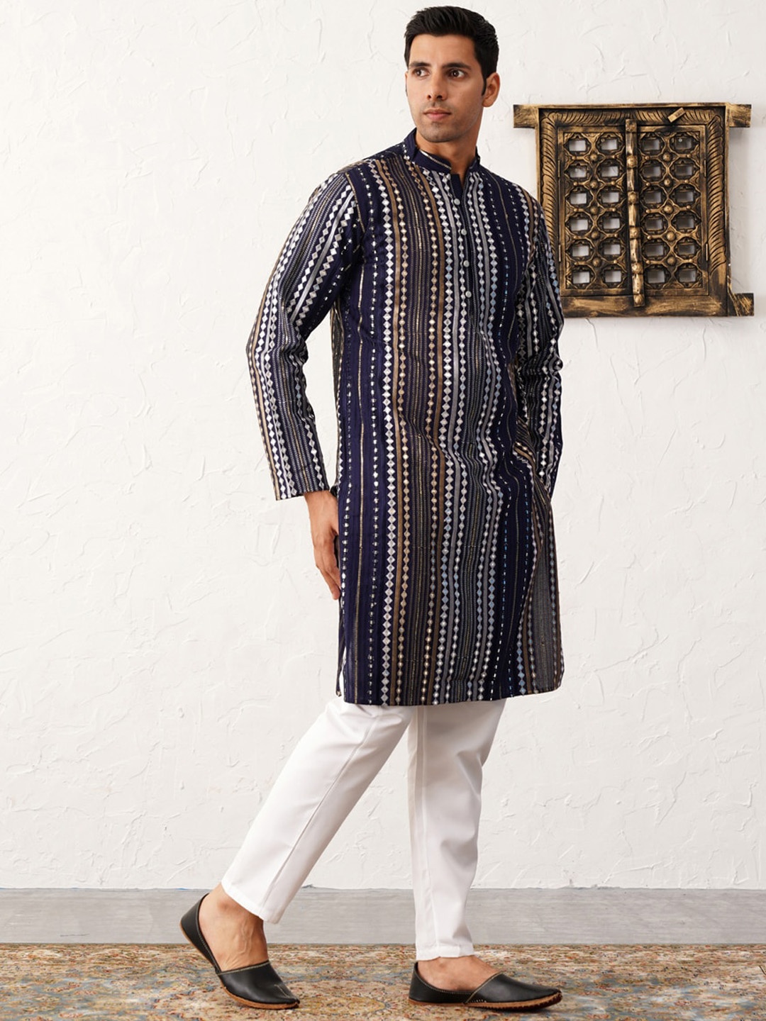 Jompers Mandarin Collar Embroidered Regular Mirror Work Straight Kurta with Pyjamas, Navy blue
Jompers Mandarin Collar Embroidered Regular Mirror Work Straight Kurta with Pyjamas, Navy blue