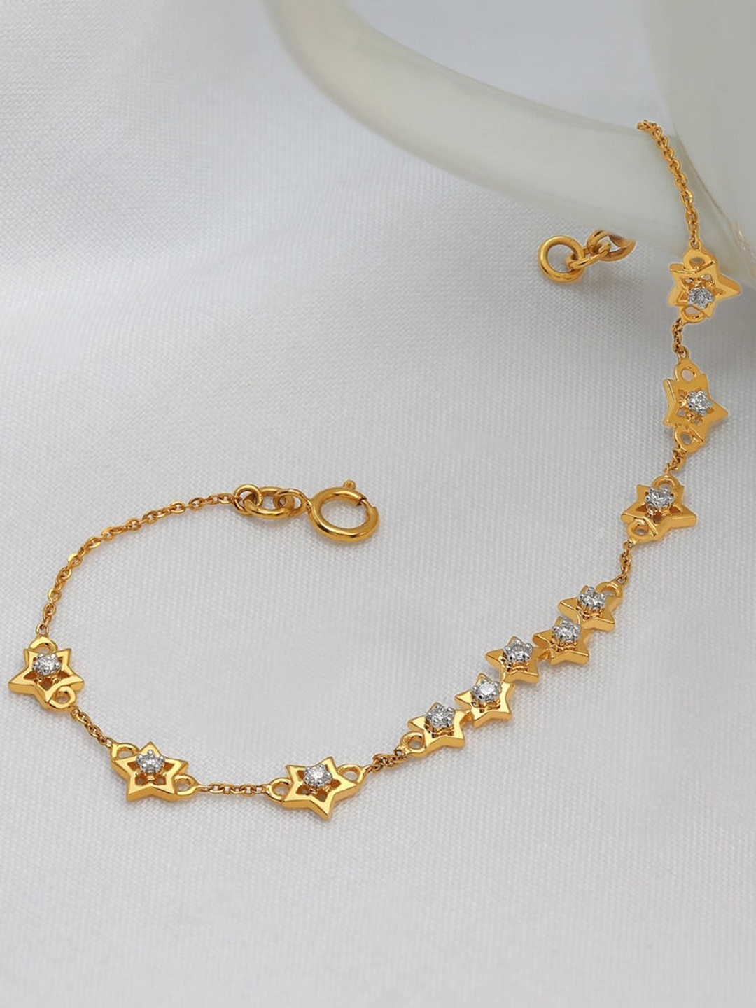 CANDERE A KALYAN JEWELLERS COMPANY 18KT (750) Gold Diamond Studded Bracelet-2.01 gm
CANDERE A KALYAN JEWELLERS COMPANY 18KT (750) Gold Diamond Studded Bracelet-2.01 gm