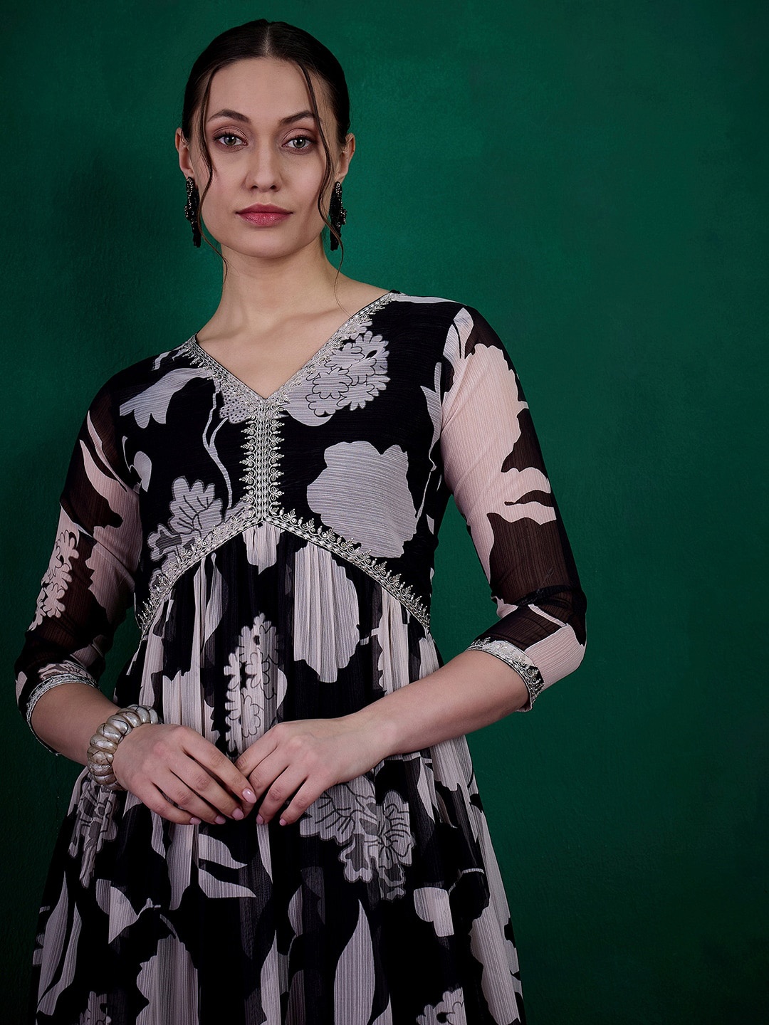 Sangria Black Embroidered Zari Sequinned With Digital Printed Alia Cut Kurta With Palazzos
Sangria Black Embroidered Zari Sequinned With Digital Printed Alia Cut Kurta With Palazzos