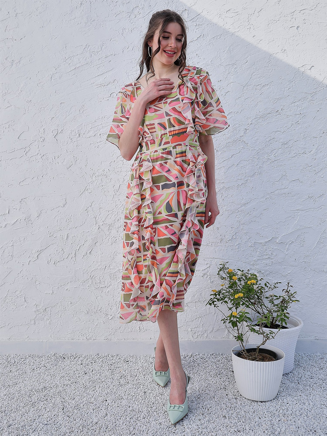 Athena Orange Abstract Printed V-Neck Flared Sleeve Ruffled Georgette A-Line Midi Dress
Athena Orange Abstract Printed V-Neck Flared Sleeve Ruffled Georgette A-Line Midi Dress