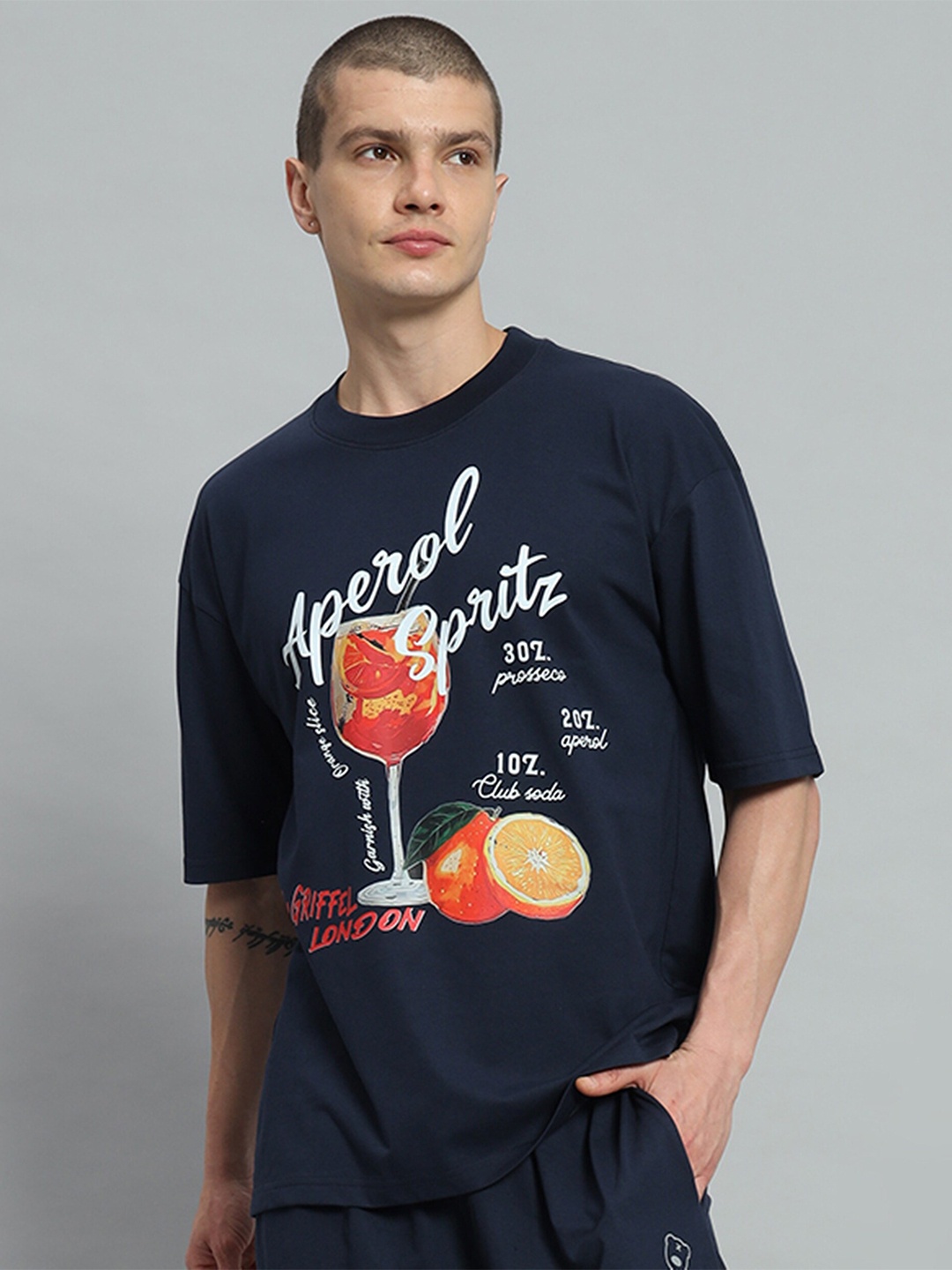 GRIFFEL Typography Printed Drop-Shoulder Sleeves Cotton Oversized T-shirt, Coffee brown
GRIFFEL Typography Printed Drop-Shoulder Sleeves Cotton Oversized T-shirt, Coffee brown