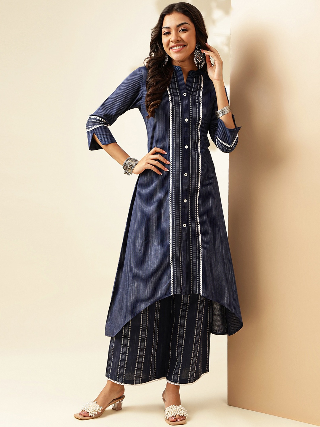 Anouk Striped Mandarin Collar Three-Quarter Sleeves Pure Cotton A-Line Kurta with Palazzos, Navy blue
Anouk Striped Mandarin Collar Three-Quarter Sleeves Pure Cotton A-Line Kurta with Palazzos, Navy blue