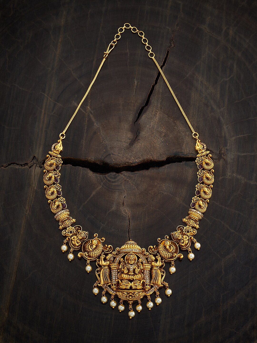 Kushal's Fashion Jewellery Copper Gold-Plated Cubic Zirconia Studded Antique Necklace
Kushal's Fashion Jewellery Copper Gold-Plated Cubic Zirconia Studded Antique Necklace