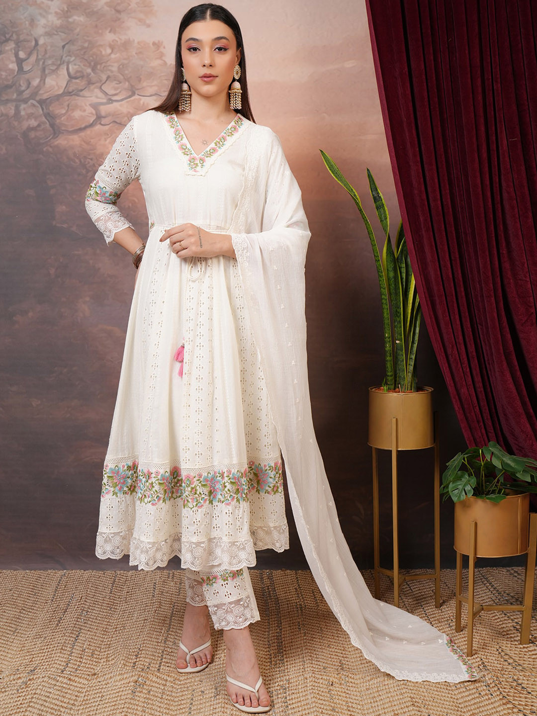 Vishudh Off White Embroidered Mirror Work Cotton Anarkali Kurta With Trousers & Dupatta
Vishudh Off White Embroidered Mirror Work Cotton Anarkali Kurta With Trousers & Dupatta