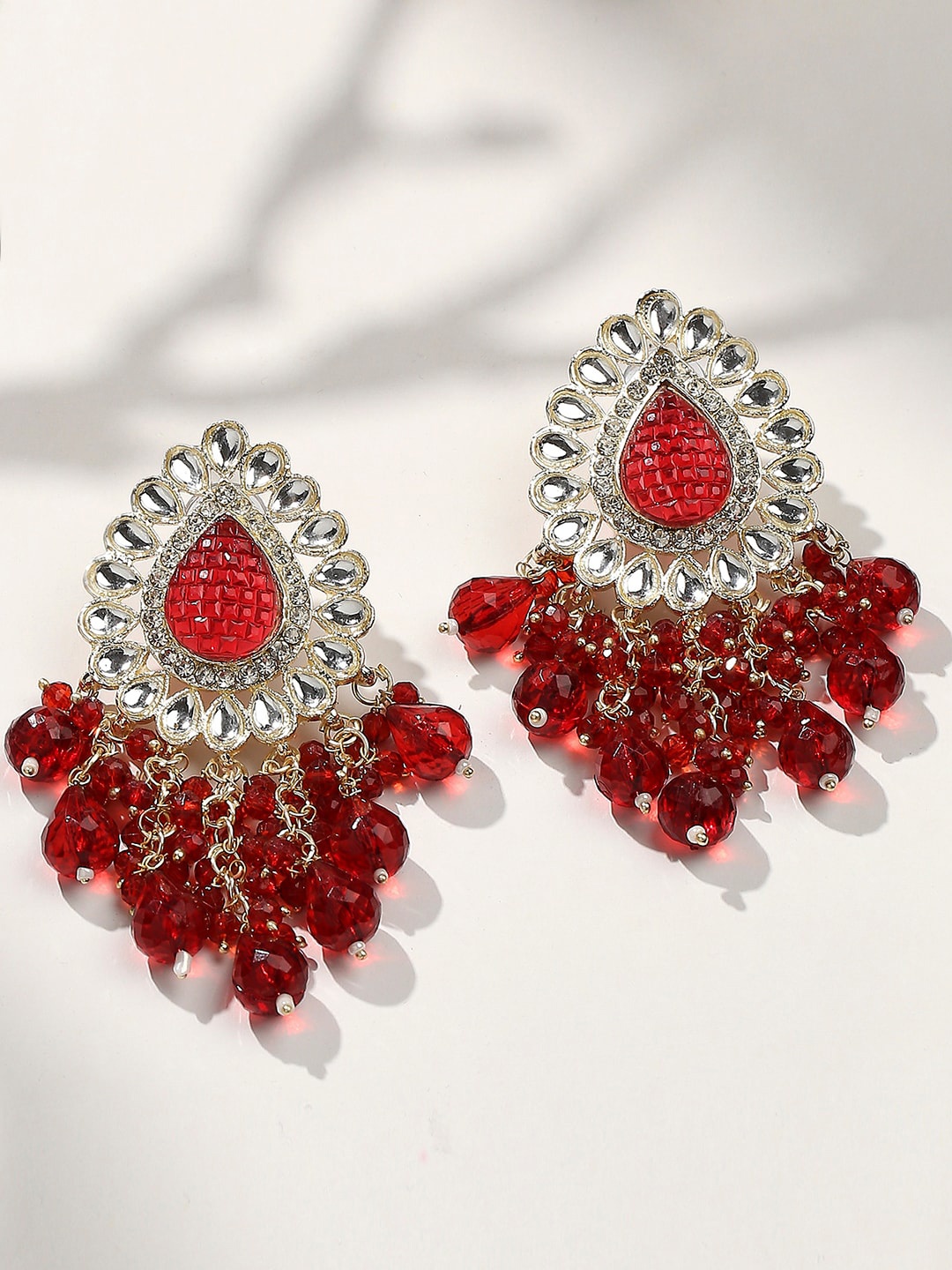 VATSALYA creation Gold-Plated Artificial Stones Studded & Beaded Leaf Shaped Drop Earrings
VATSALYA creation Gold-Plated Artificial Stones Studded & Beaded Leaf Shaped Drop Earrings