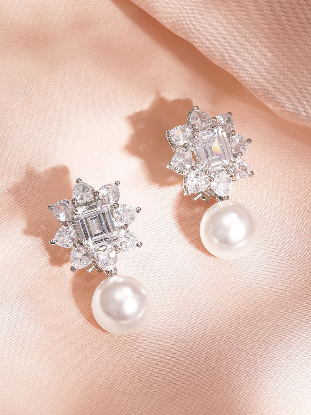Rubans Silver Plated AD Studded Artificial White Pearls Hanging Floral Drop Earrings
Rubans Silver Plated AD Studded Artificial White Pearls Hanging Floral Drop Earrings