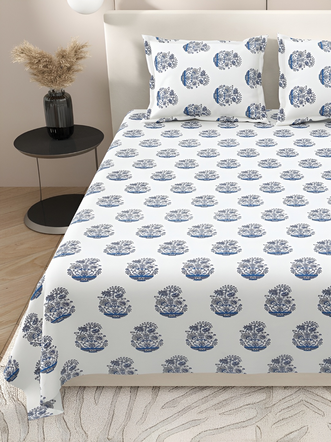 BELLA CASA Blue & White Ethnic Motifs 200 TC Cotton King Bedsheet With 2 Pillow Covers
BELLA CASA Blue & White Ethnic Motifs 200 TC Cotton King Bedsheet With 2 Pillow Covers