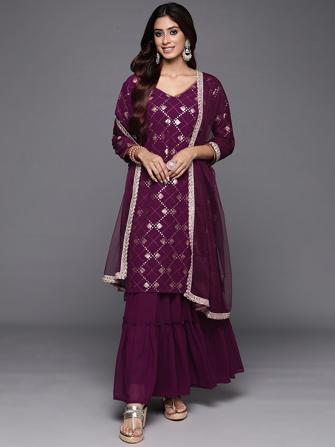 Indo Era Embroidered Regular Sequinned Straight Kurta with Sharara & With Dupatta, Burgundy
Indo Era Embroidered Regular Sequinned Straight Kurta with Sharara & With Dupatta, Burgundy