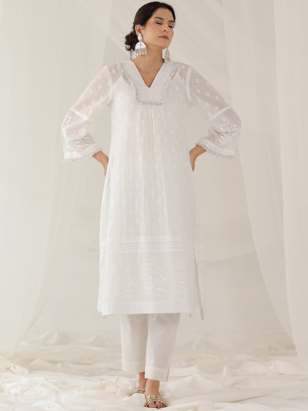 PINK CACTII V Neck Long Flared Sleeves Floral Printed Pure Cotton Kurta with Trouser, White
PINK CACTII V Neck Long Flared Sleeves Floral Printed Pure Cotton Kurta with Trouser, White