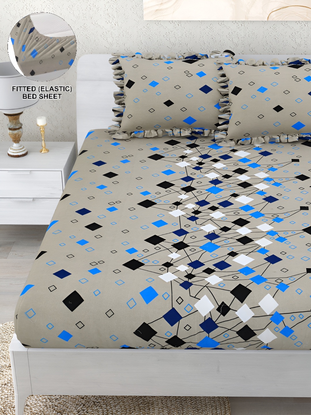 DREAM WEAVERZ Grey & Blue Geometric 260 TC Fitted Bedsheet with 2 Frill Pillow Covers
DREAM WEAVERZ Grey & Blue Geometric 260 TC Fitted Bedsheet with 2 Frill Pillow Covers