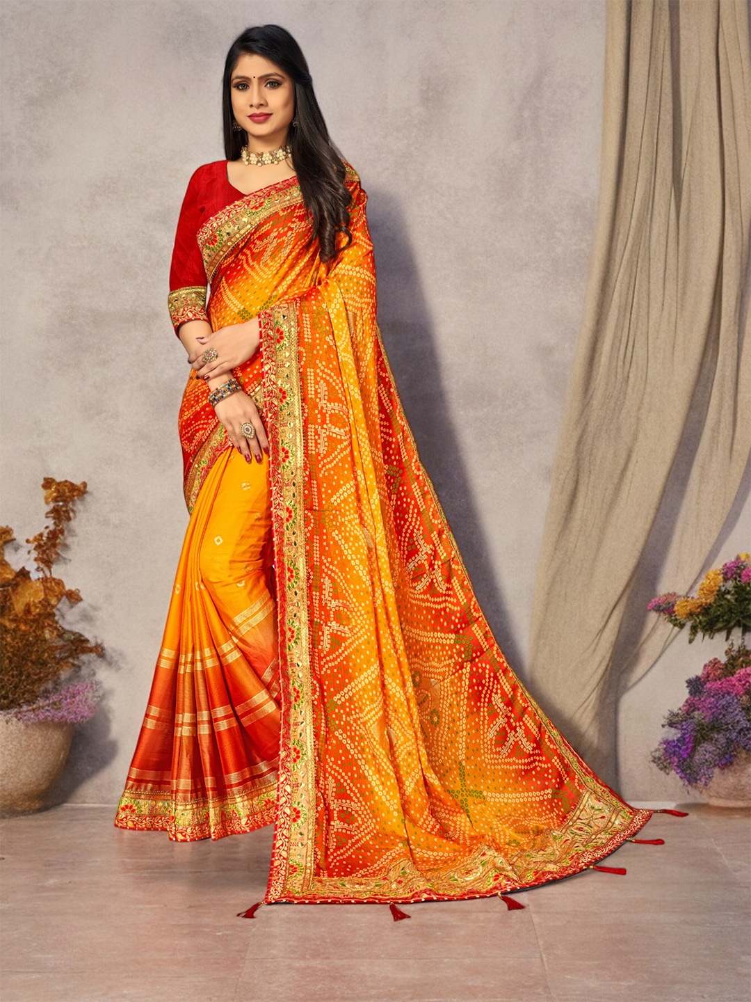 Ambuja International Foil Printed Embroidered Pure Georgette Bandhani Saree, Orange
Ambuja International Foil Printed Embroidered Pure Georgette Bandhani Saree, Orange