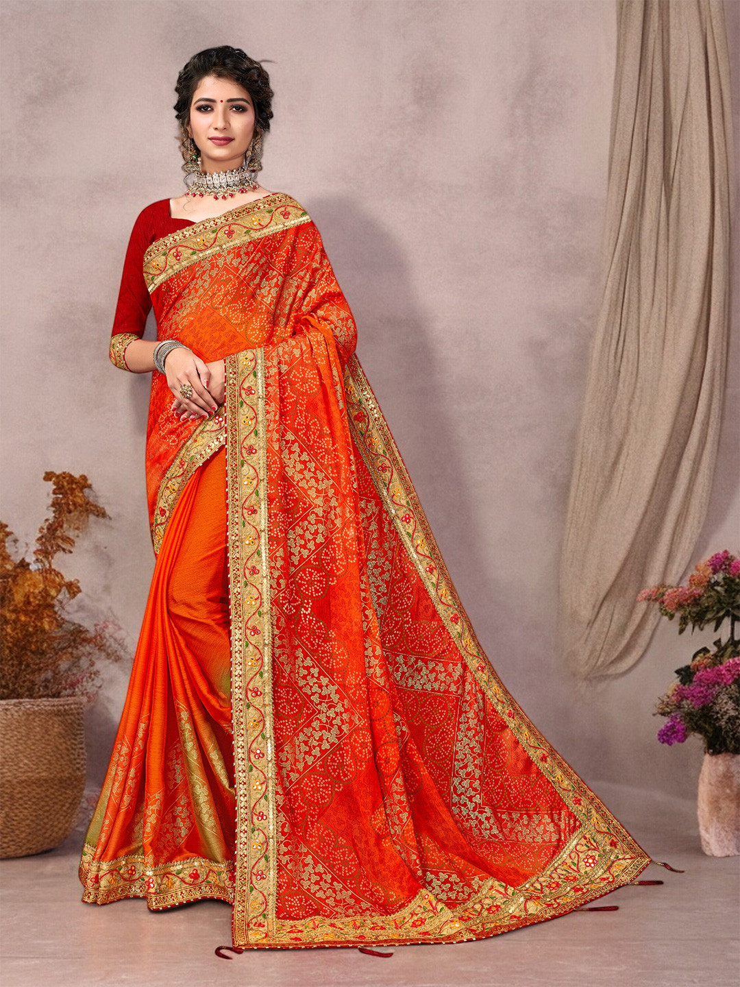 Ambuja International Bandhani Embroidered Pure Georgette Bandhani Saree, Orange 
Ambuja International Bandhani Embroidered Pure Georgette Bandhani Saree, Orange