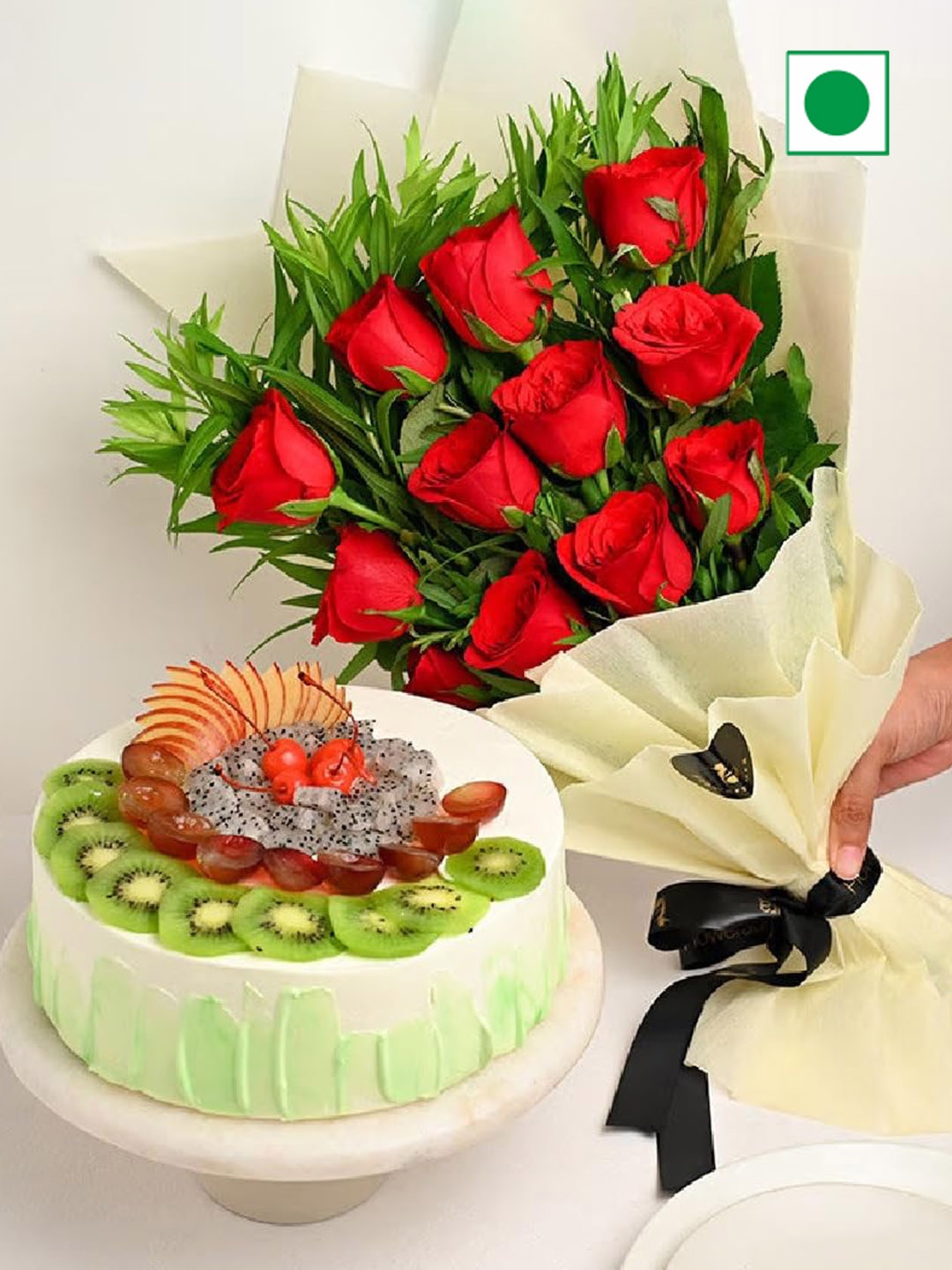 Floweraura Fruit Eggless Round Cake 500gm with 12-Pcs Fresh Red Roses Bouquet, White
Floweraura Fruit Eggless Round Cake 500gm with 12-Pcs Fresh Red Roses Bouquet, White