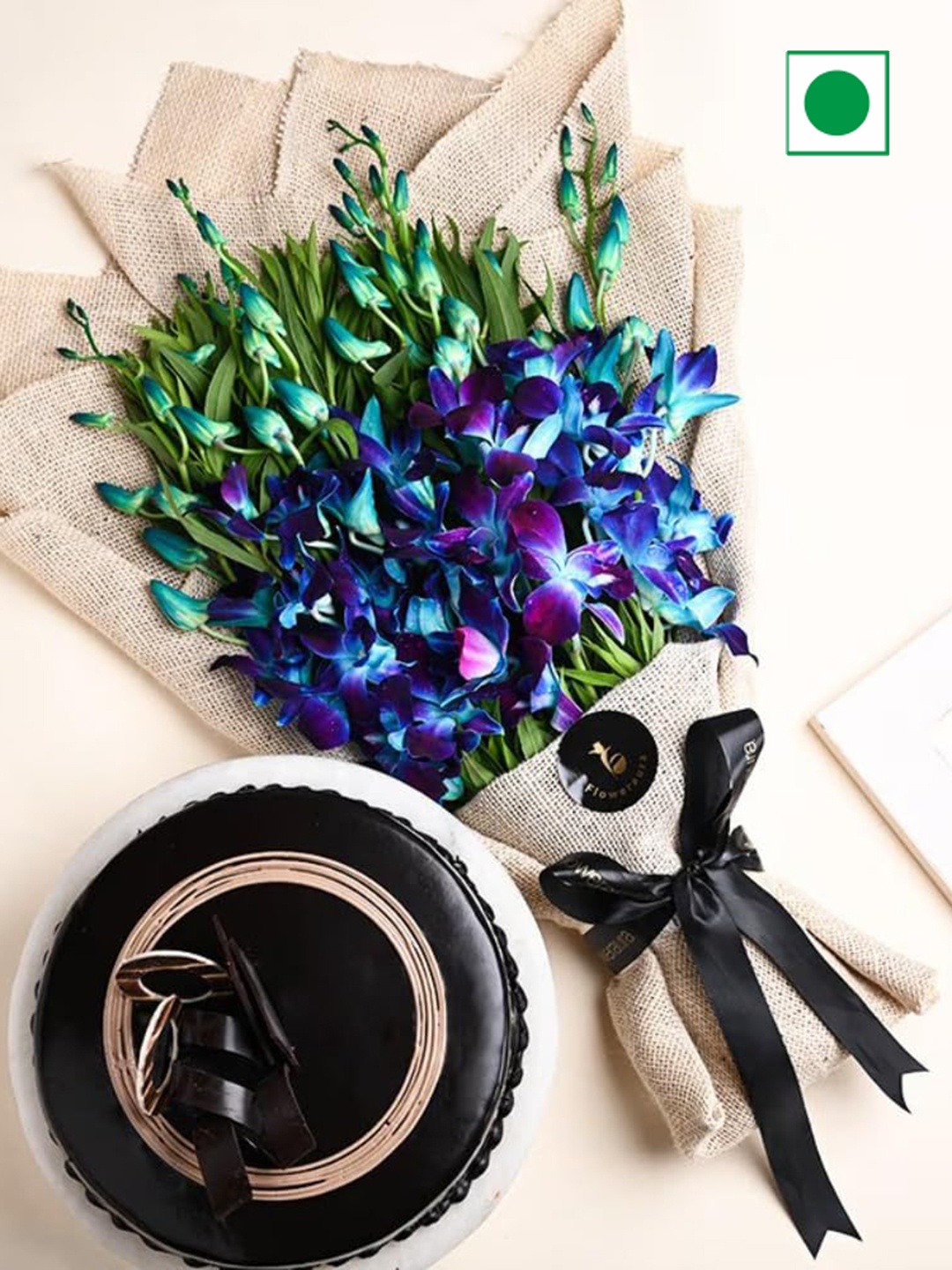 Floweraura Chocolate Flavour Eggless Round Cake 500gm with 6 Pcs Flower Bouquet, Blue
Floweraura Chocolate Flavour Eggless Round Cake 500gm with 6 Pcs Flower Bouquet, Blue