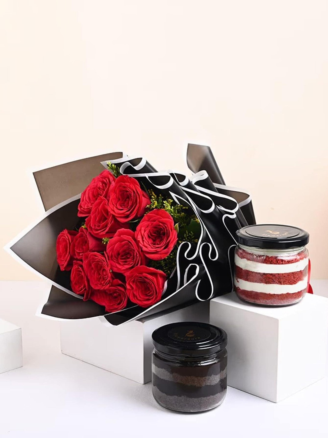 Floweraura Flowers Bouquet 12 Red Roses With Set of 2 Chocolate & Red Velvet Jar Cakes
Floweraura Flowers Bouquet 12 Red Roses With Set of 2 Chocolate & Red Velvet Jar Cakes