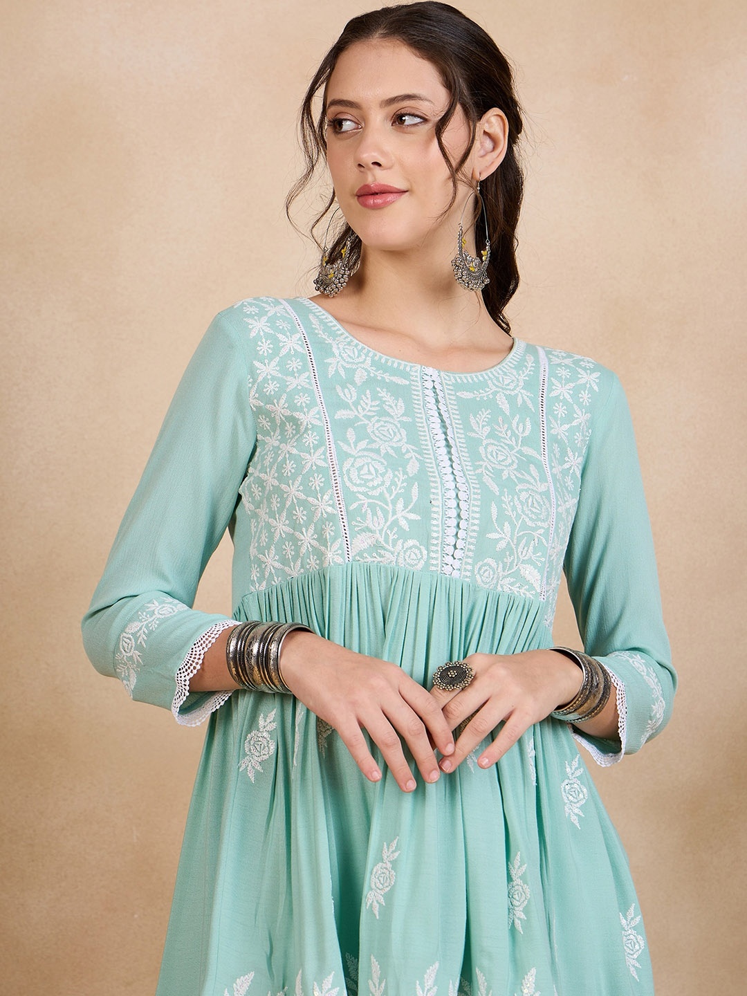 Anouk Ethnic Motifs Embroidered Empire Thread Work A-Line Kurti with Trousers, Sea green
Anouk Ethnic Motifs Embroidered Empire Thread Work A-Line Kurti with Trousers, Sea green