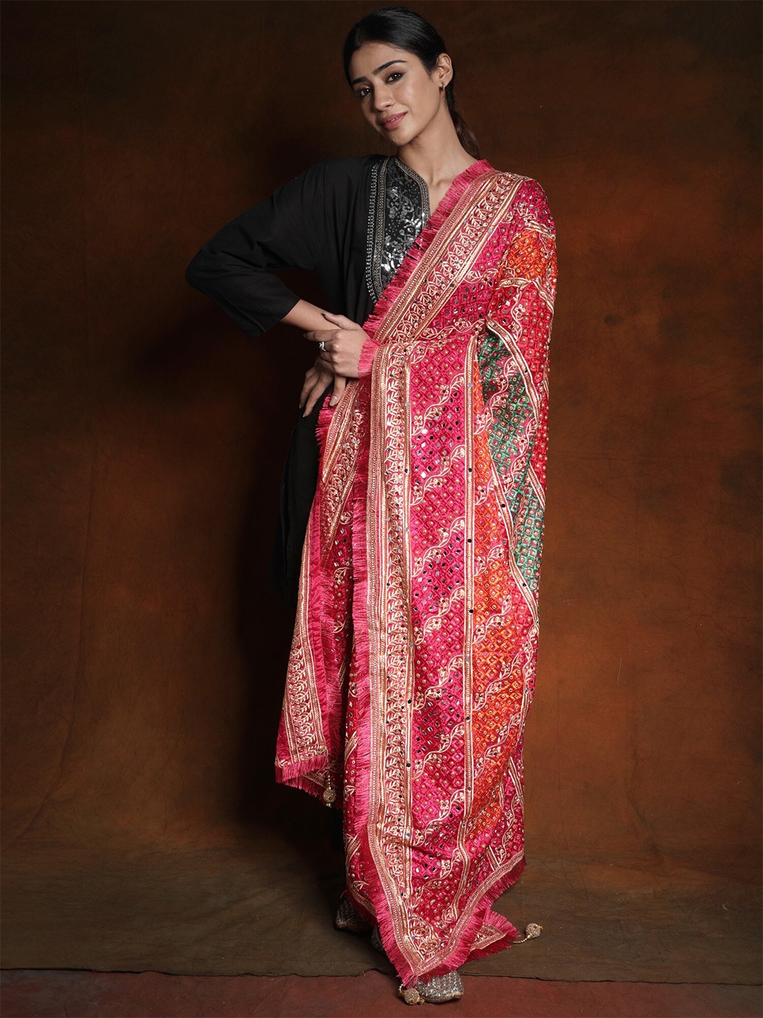 Exotic India Pink Peacock Phulkari Mirror Embroidered Silk Dupatta and Gotapatti Border
Exotic India Pink Peacock Phulkari Mirror Embroidered Silk Dupatta and Gotapatti Border
