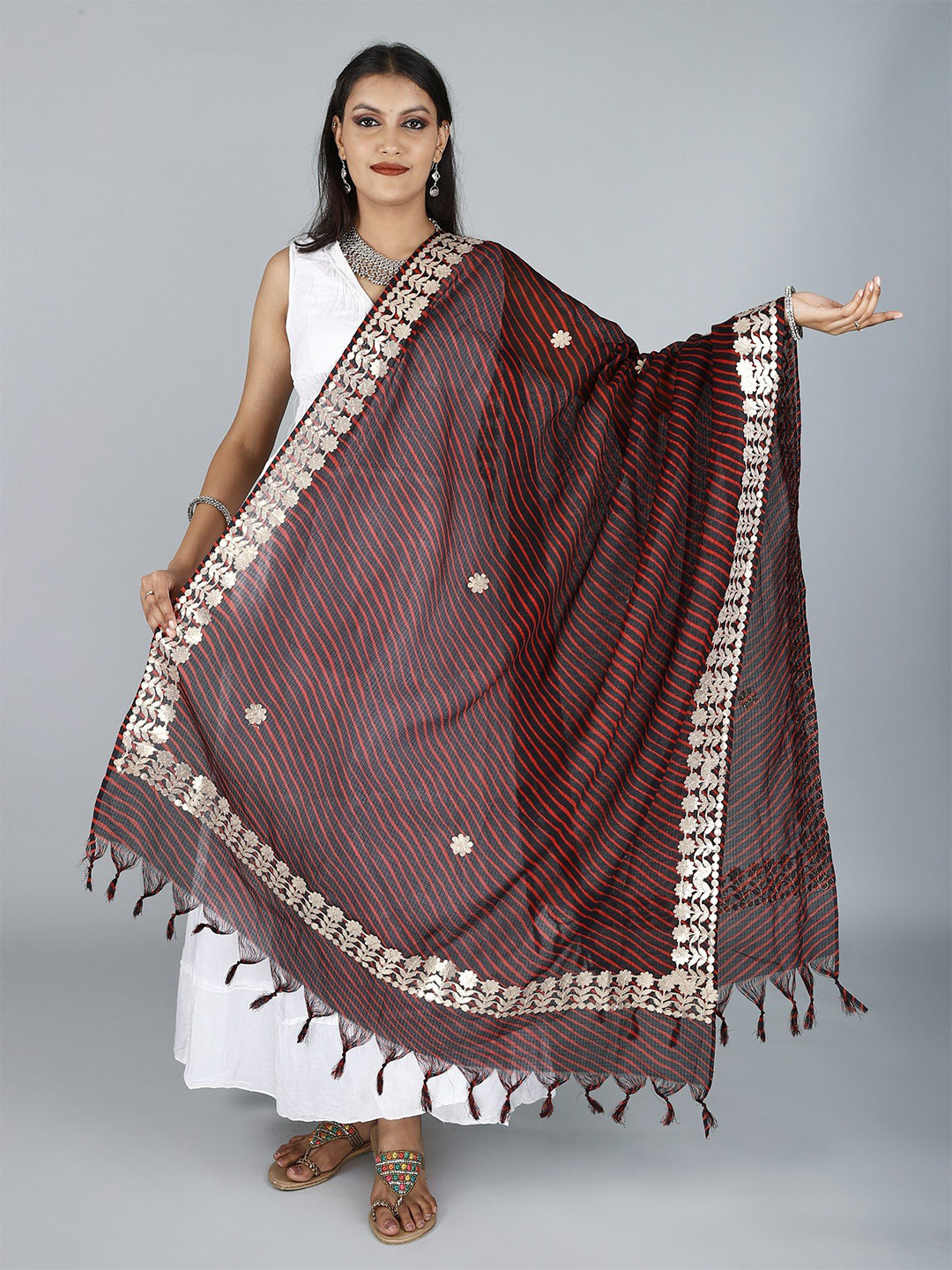 Exotic India Black Leheria Kota Doria Extra-Wide Jodhpuri Cotton Dupatta with Gota Border
Exotic India Black Leheria Kota Doria Extra-Wide Jodhpuri Cotton Dupatta with Gota Border