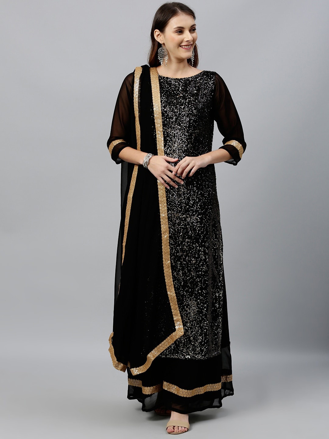 Ethnovog Embroidered Boat Neck Sequinned Straight Kurta with Sharara & Dupatta, Black
Ethnovog Embroidered Boat Neck Sequinned Straight Kurta with Sharara & Dupatta, Black