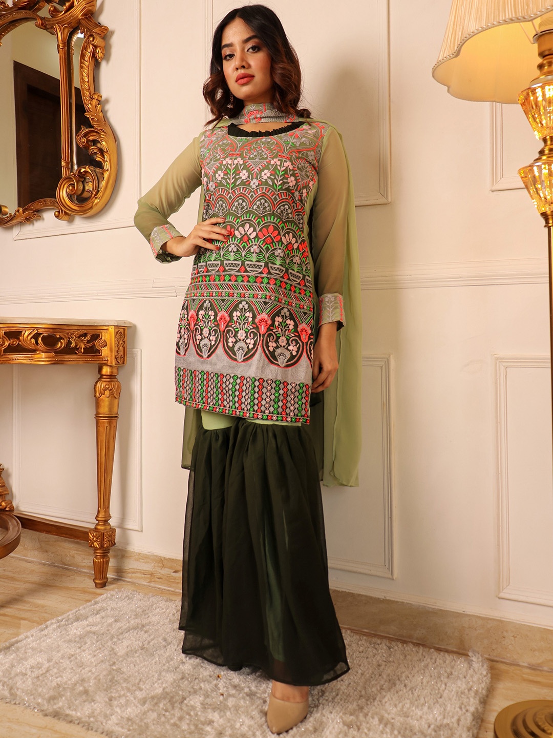 Vidraa Western Store Floral Embroidered Regular Thread Work Kurti with Sharara & Dupatta, Green
Vidraa Western Store Floral Embroidered Regular Thread Work Kurti with Sharara & Dupatta, Green