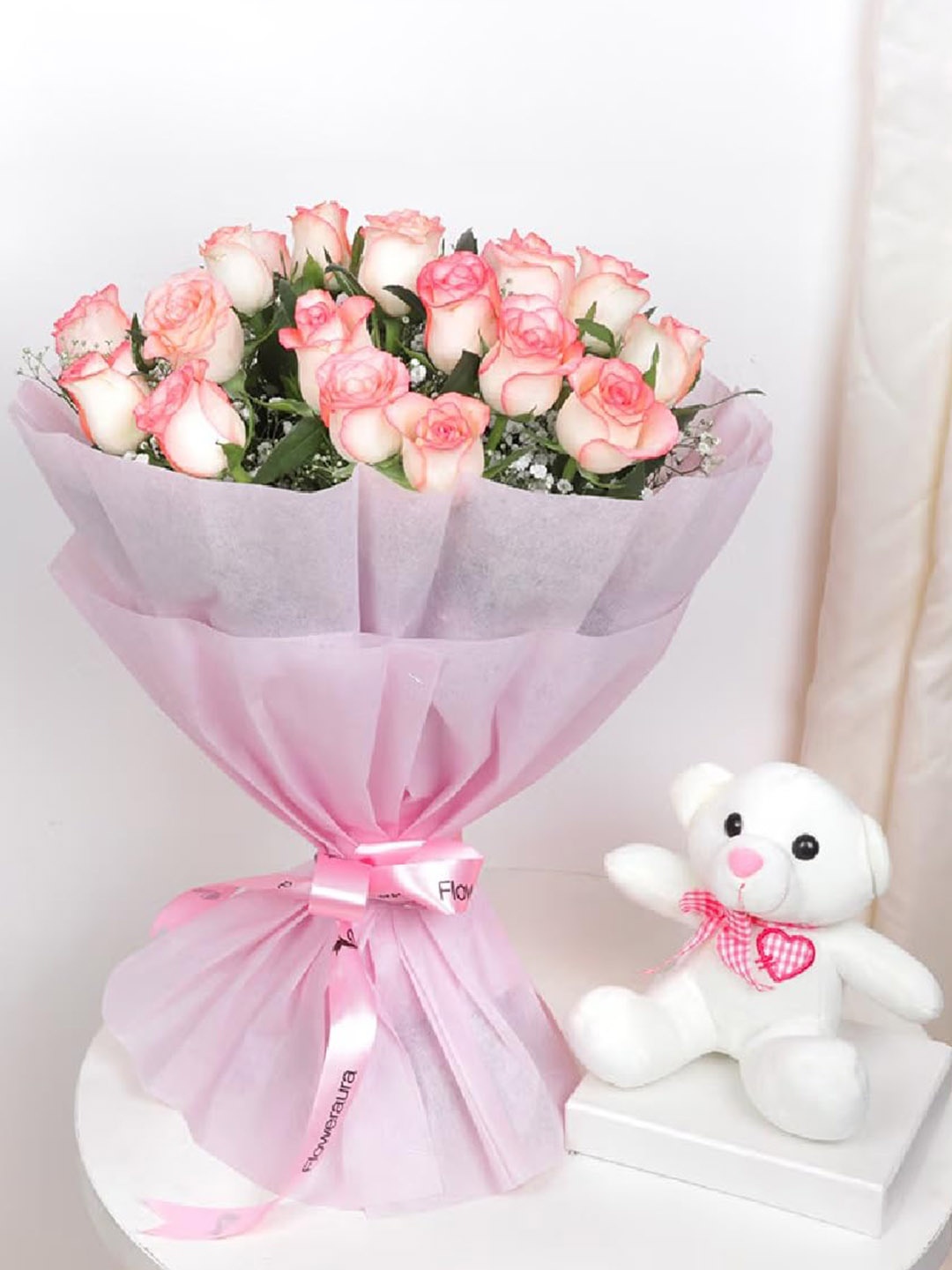 Floweraura Flowers Bouquet Fresh Live 20 Pink Roses In Paper Packing With Cute Teddy Bear
Floweraura Flowers Bouquet Fresh Live 20 Pink Roses In Paper Packing With Cute Teddy Bear