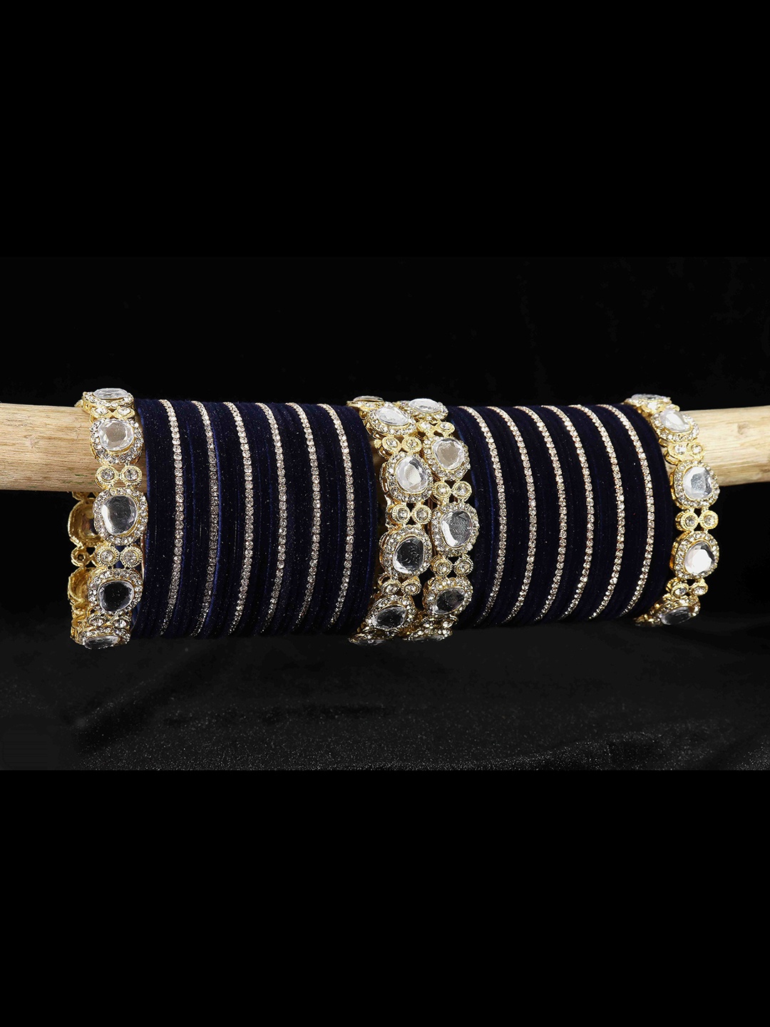 LAVAZZA Set of 58 Gold-plated Zircon & Kundan-Studded Metal Velvet Bangles Chuda Set
LAVAZZA Set of 58 Gold-plated Zircon & Kundan-Studded Metal Velvet Bangles Chuda Set