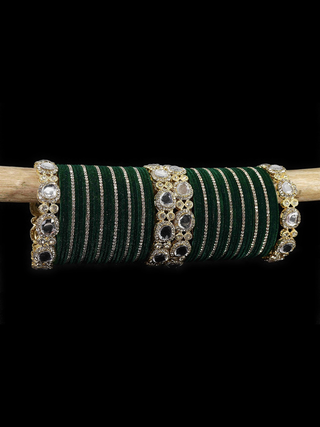 LAVAZZA Set of 58 Gold-plated Zircon & Kundan-Studded Metal Velvet Bangles Chuda Set
LAVAZZA Set of 58 Gold-plated Zircon & Kundan-Studded Metal Velvet Bangles Chuda Set