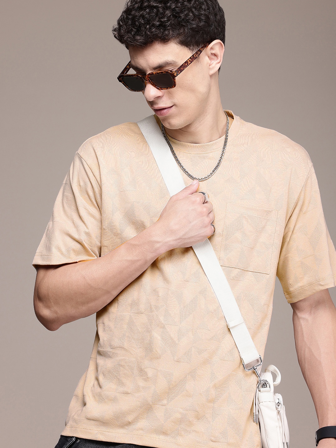 The Roadster Life Co. Self Design Drop-Shoulder Sleeves Relaxed Fit Pocket T-shirt, Beige
The Roadster Life Co. Self Design Drop-Shoulder Sleeves Relaxed Fit Pocket T-shirt, Beige