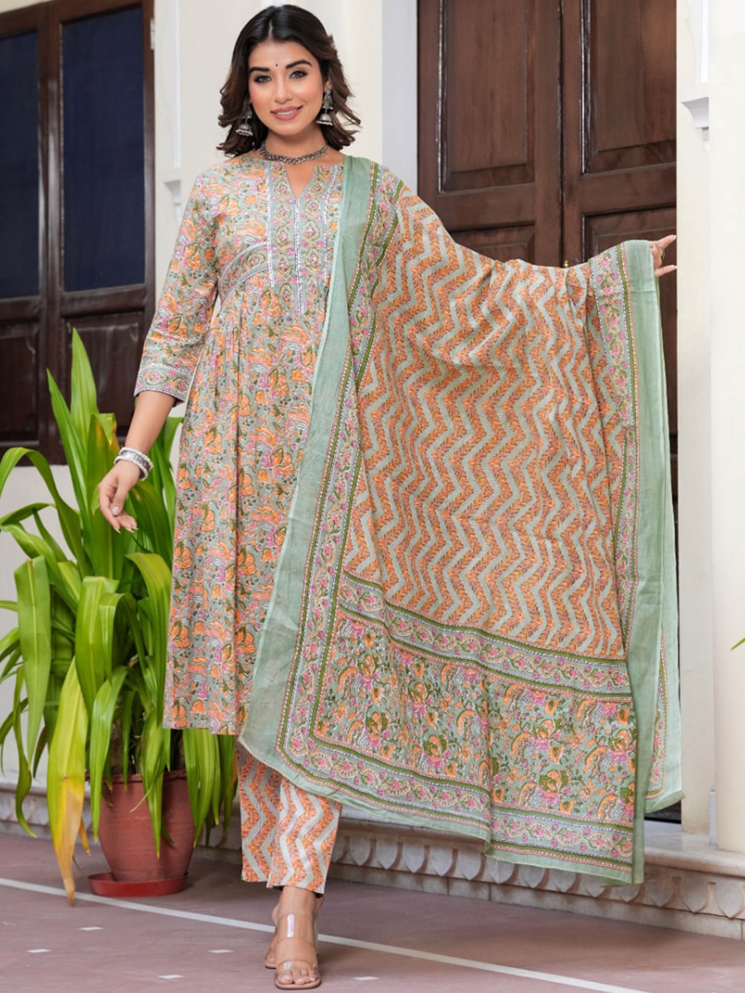 KALINI Floral Printed Regular Mirror Work Pure Cotton A-Line Kurta With Trousers & Dupatta, Green
KALINI Floral Printed Regular Mirror Work Pure Cotton A-Line Kurta With Trousers & Dupatta, Green