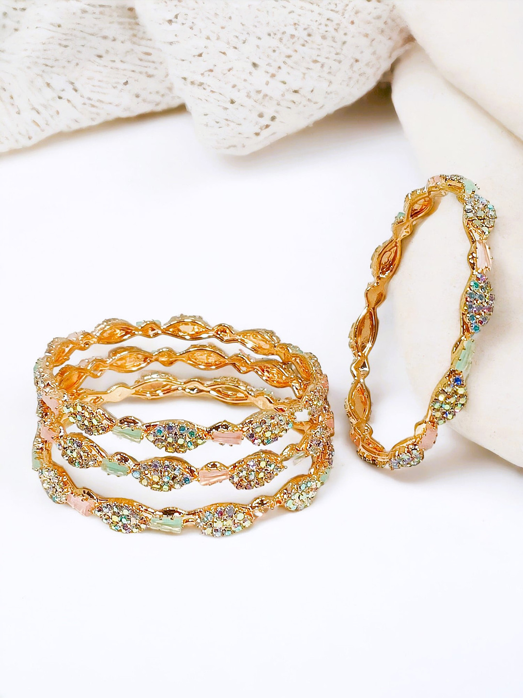 FEMMIBELLA Set of 4 Rose Gold-Plated Stone Studded Bangles
FEMMIBELLA Set of 4 Rose Gold-Plated Stone Studded Bangles
