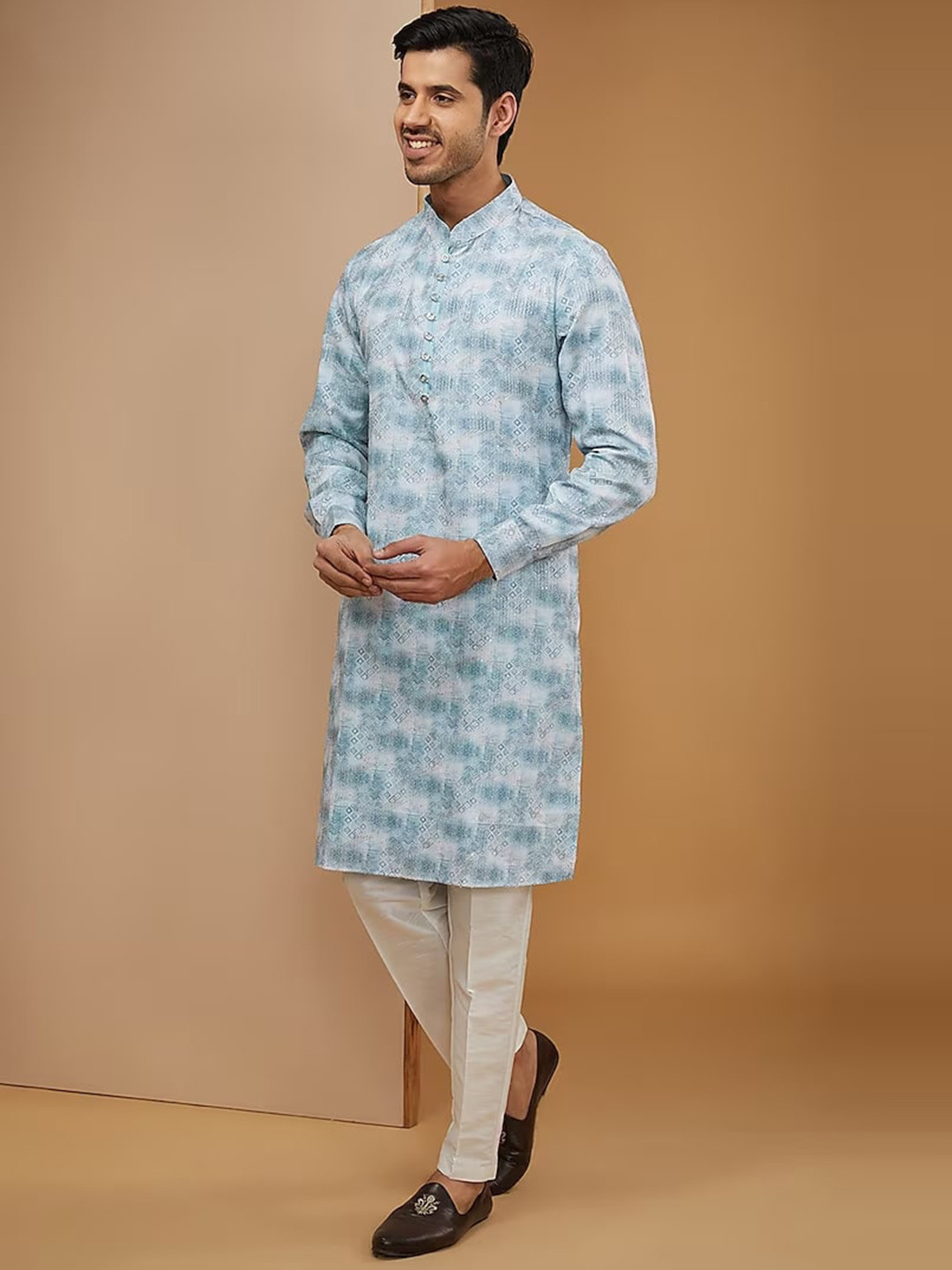 RNG Safawala Geometric Printed Mandarin Collar Ikat Kurta with Trousers, Blue
RNG Safawala Geometric Printed Mandarin Collar Ikat Kurta with Trousers, Blue