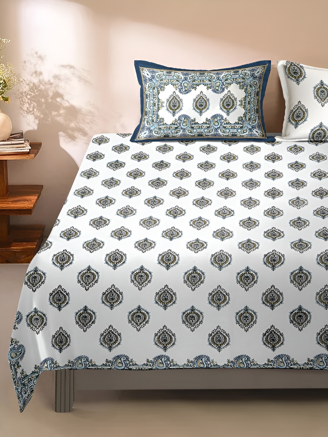 Rajasthan Decor White & Blue Ethnic Motifs 180 TC King Bedsheet with 2 Pillow Covers
Rajasthan Decor White & Blue Ethnic Motifs 180 TC King Bedsheet with 2 Pillow Covers