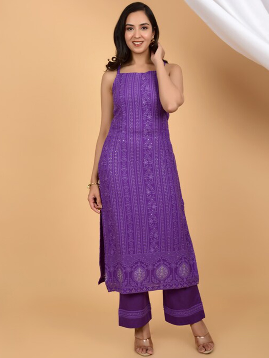 HANDME Floral Embroidered Shoulder Straps Chikankari Straight Kurta with Palazzos, Purple
HANDME Floral Embroidered Shoulder Straps Chikankari Straight Kurta with Palazzos, Purple