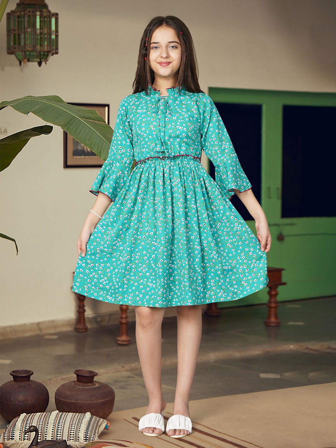 White World Girls Floral Printed Tie-Up Neck Bell Sleeves Fit & Flare Dress, Turquoise blue
White World Girls Floral Printed Tie-Up Neck Bell Sleeves Fit & Flare Dress, Turquoise blue