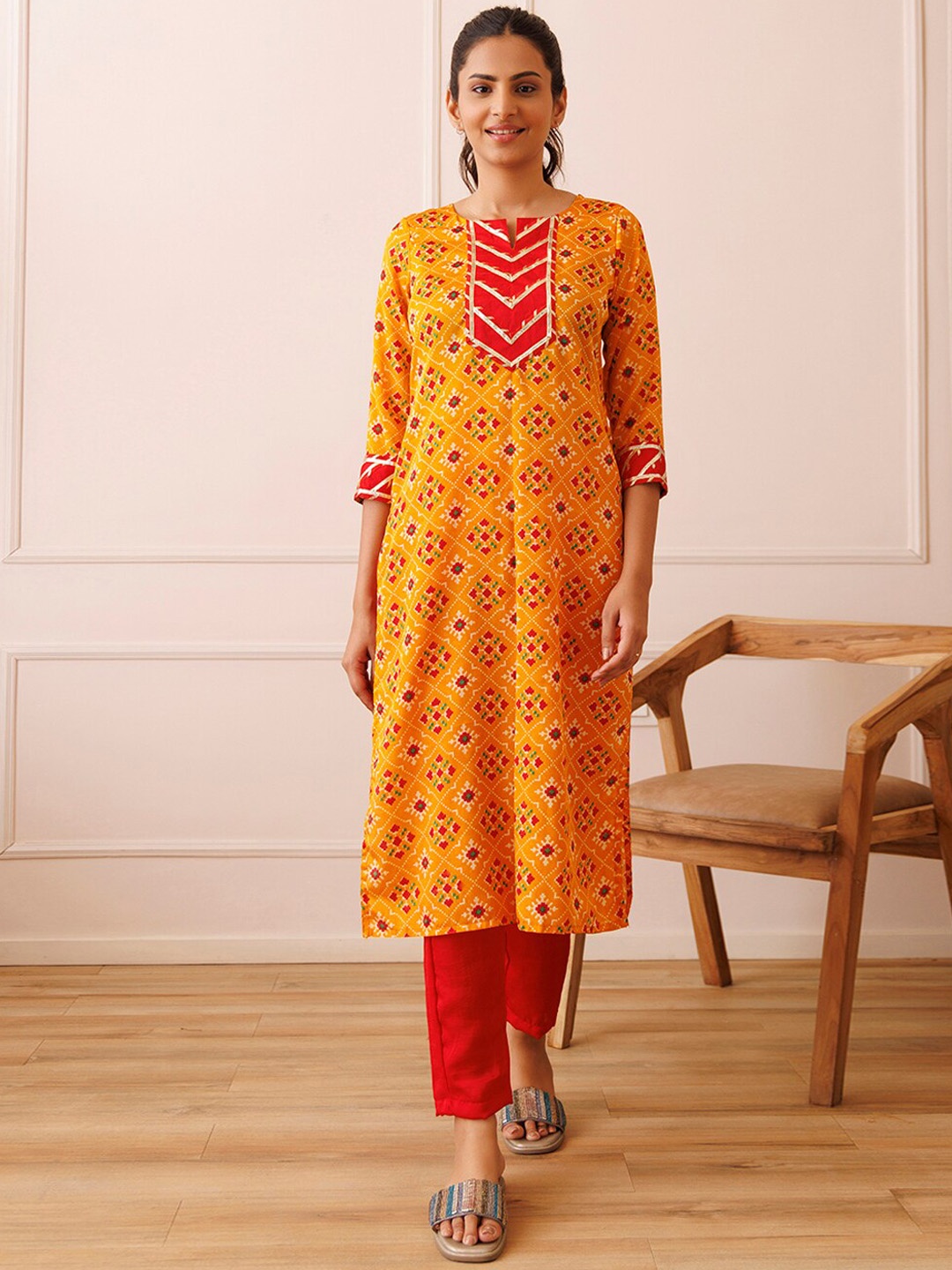 Ragavi Notch Neck Ethnic Motifs Printed Regular Gotta Patti Straight Kurta with Trousers, Yellow
Ragavi Notch Neck Ethnic Motifs Printed Regular Gotta Patti Straight Kurta with Trousers, Yellow