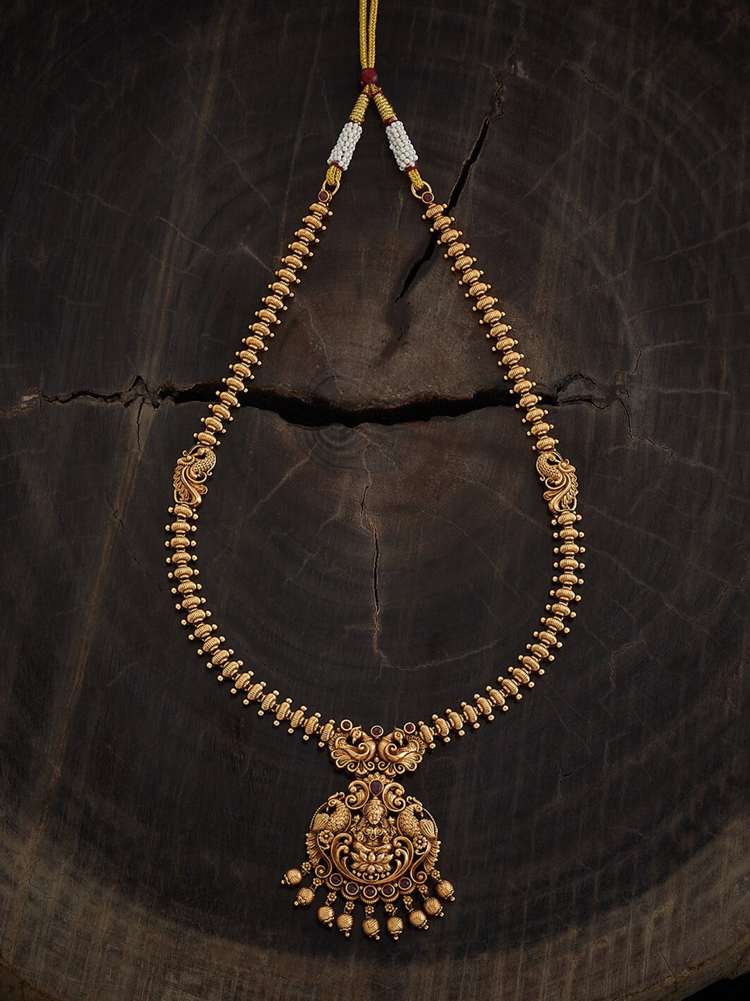 Kushal's Fashion Jewellery Copper Gold-Plated Ruby Studded & Beaded Antique Necklace
Kushal's Fashion Jewellery Copper Gold-Plated Ruby Studded & Beaded Antique Necklace
