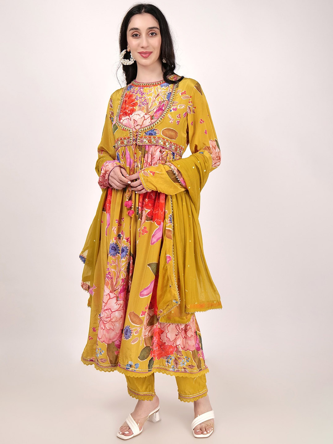 SHIWANGI COUTURE Floral Printed Sequinned Empire Anarkali Kurta With Trousers & Dupatta, Mustard
SHIWANGI COUTURE Floral Printed Sequinned Empire Anarkali Kurta With Trousers & Dupatta, Mustard