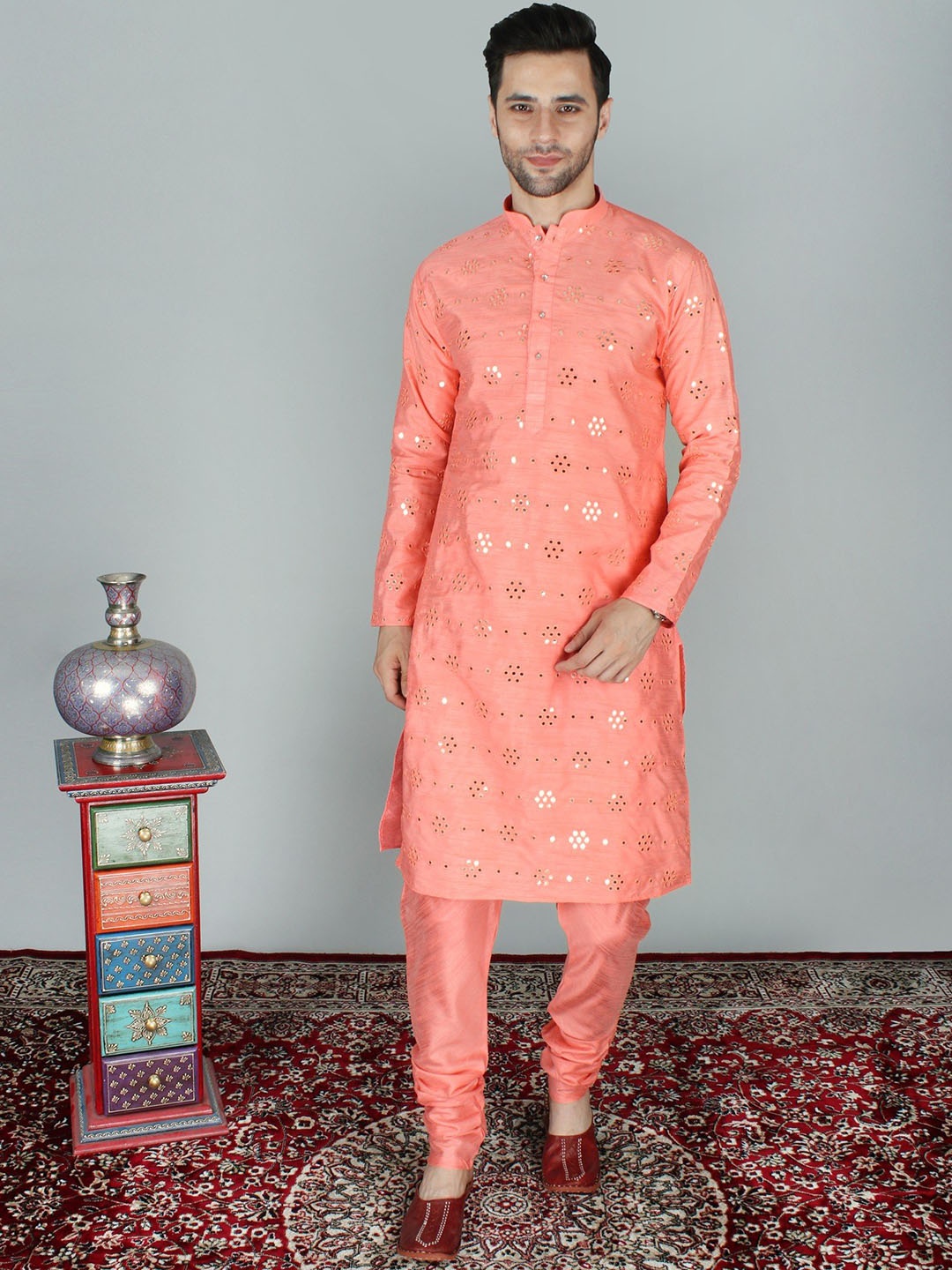 Exotic India Art Silk Abhala with Thread Detailing Mirror Work Straight Kurta with Pyjamas, Peach
Exotic India Art Silk Abhala with Thread Detailing Mirror Work Straight Kurta with Pyjamas, Peach