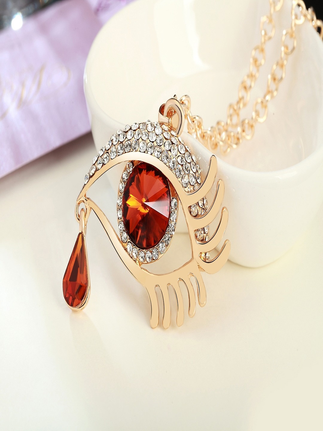 UNIVERSITY TRENDZ Gold-Plated Cubic Zirconia Studded Teardrop Shaped Pendants with Chain
UNIVERSITY TRENDZ Gold-Plated Cubic Zirconia Studded Teardrop Shaped Pendants with Chain