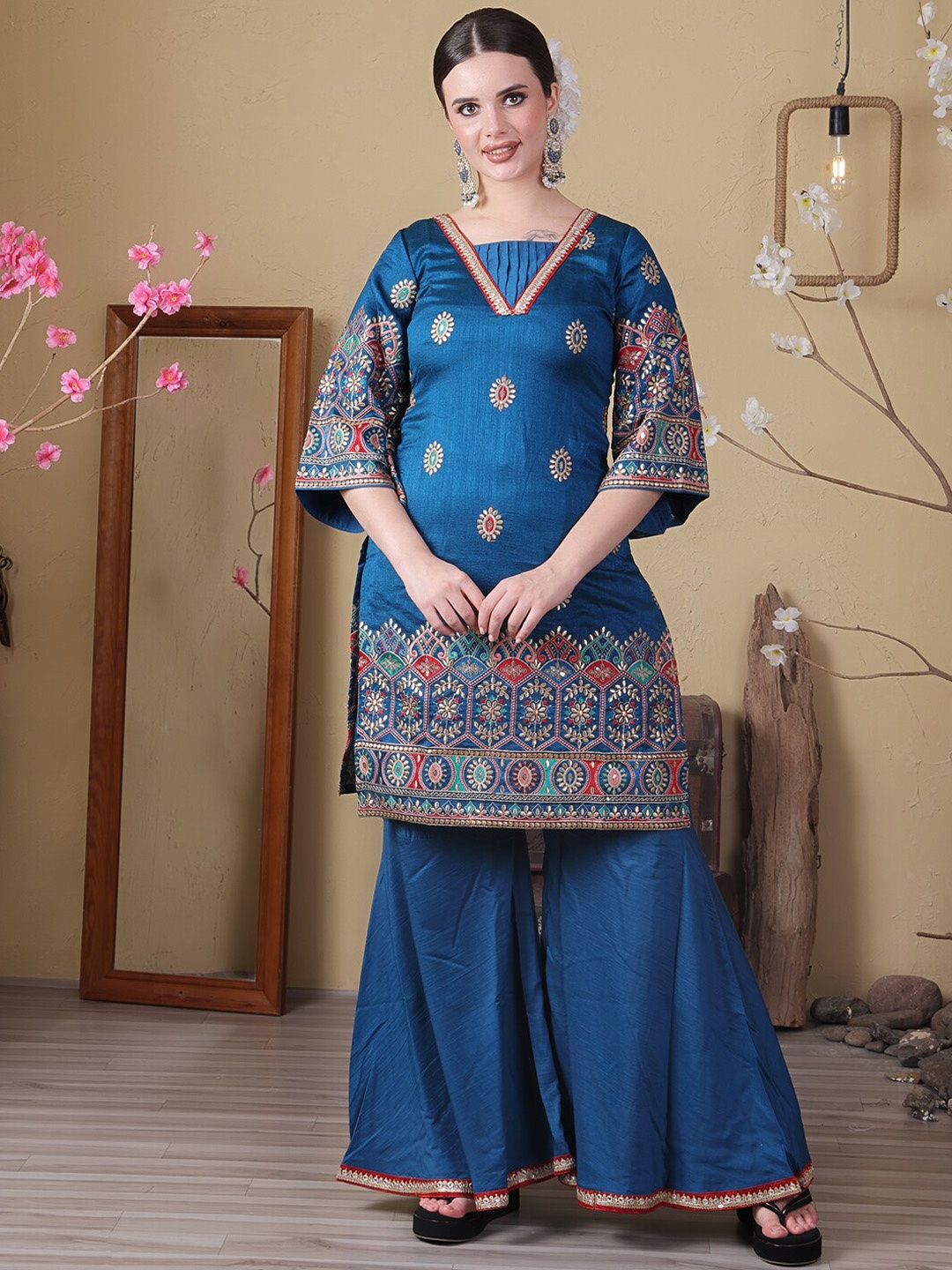 Ethnovog Ethnic Motifs Embroidered Sequinned Straight Kurta with Sharara & Dupatta, Blue
Ethnovog Ethnic Motifs Embroidered Sequinned Straight Kurta with Sharara & Dupatta, Blue