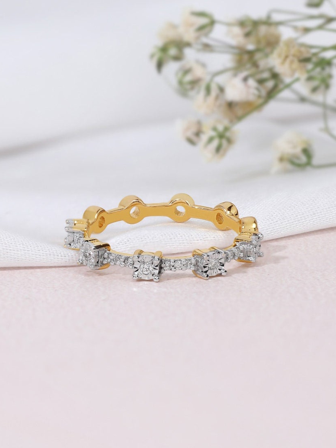 CANDERE A KALYAN JEWELLERS COMPANY 18KT Gold Diamond Studded Band Finger Ring-2.16gm
CANDERE A KALYAN JEWELLERS COMPANY 18KT Gold Diamond Studded Band Finger Ring-2.16gm