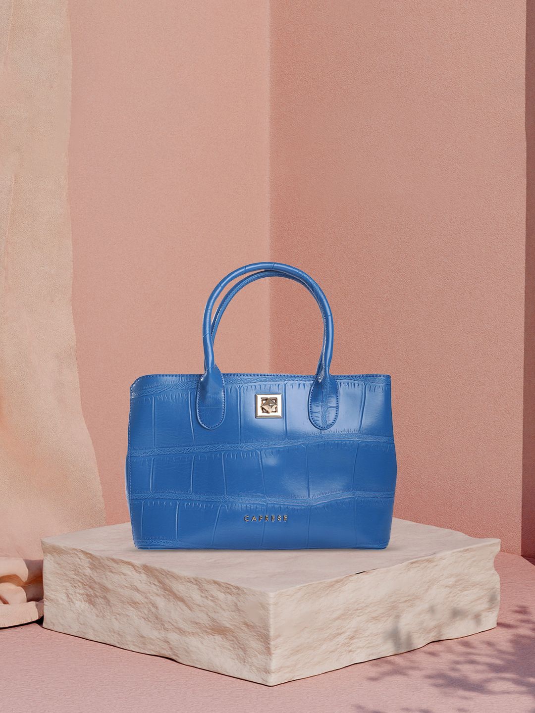 Caprese The Kiara Collection Mink Small Ultramarine Handheld Bag with With Double Handle, Blue
Caprese The Kiara Collection Mink Small Ultramarine Handheld Bag with With Double Handle, Blue