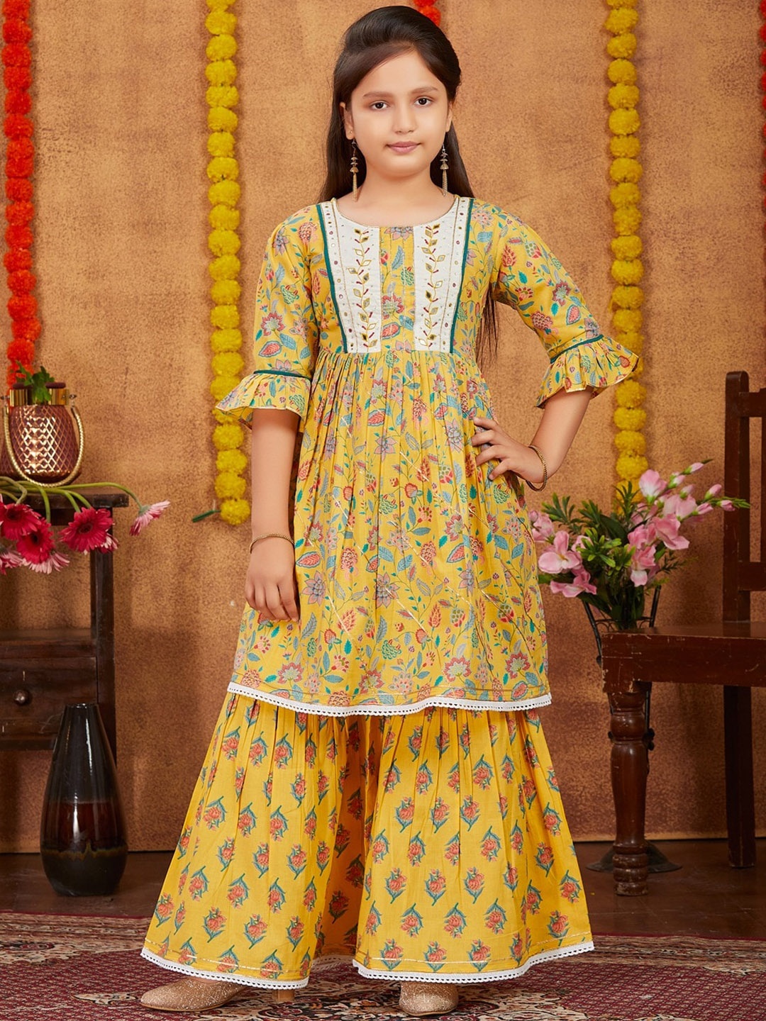 BAESD Girls Floral Printed Yoke Design Pure Cotton Bell Sleeves Kurta With Sharara, Yellow
BAESD Girls Floral Printed Yoke Design Pure Cotton Bell Sleeves Kurta With Sharara, Yellow