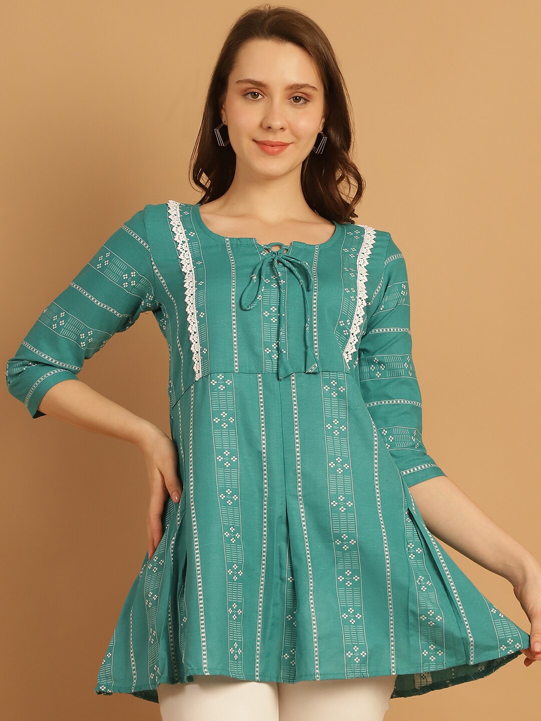 Aarsha Ethnic Motifs Printed Tie Up Neck Three-Quarter Sleeves Pure Cotton Short Kurti, Green
Aarsha Ethnic Motifs Printed Tie Up Neck Three-Quarter Sleeves Pure Cotton Short Kurti, Green